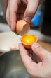 cracking eggs and seperate yolk from albumen