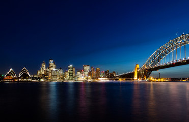 Fototapete - Skyline of Sydney by Night