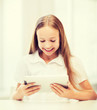 © Syda Productions - girl with tablet pc at school