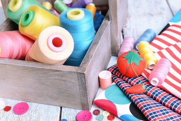 Wall Mural - Sewing Accessories in wooden box on table close-up