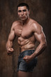 Strong muscular man. Naked torso.