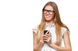 Happy smiling woman holding a mobile phone looking away isolated