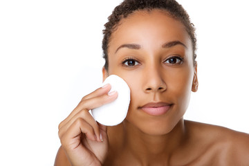 Beautiful black woman removing make up