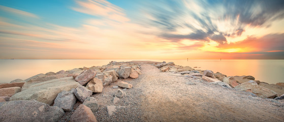 Wall Mural - barceloneta beach in barcelona at sunrise