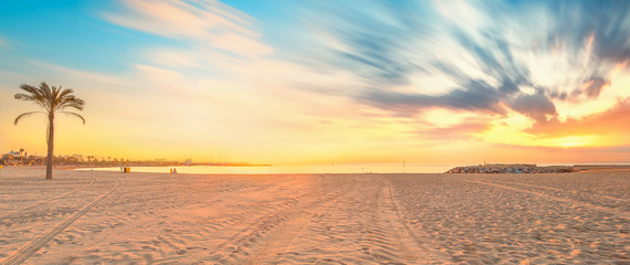 Wall Mural - barceloneta beach in barcelona at sunrise