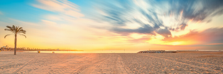 Wall Mural - barceloneta beach in barcelona at sunrise