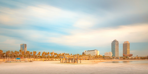Wall Mural - barceloneta beach in barcelona at sunrise