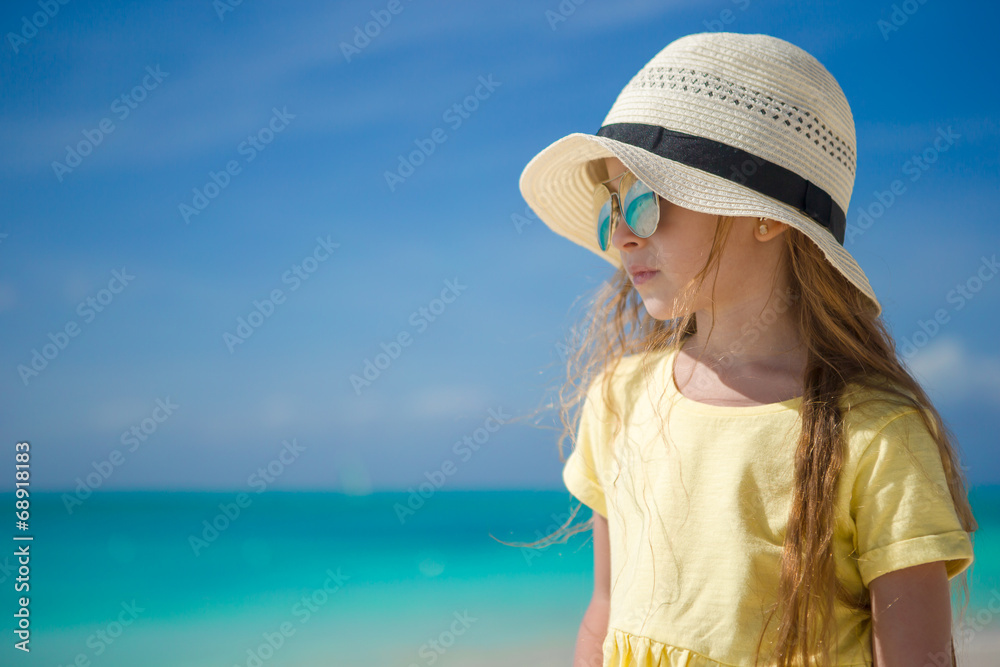 Happy little girl on beach during summer vacation Stock Photo | Adobe Stock