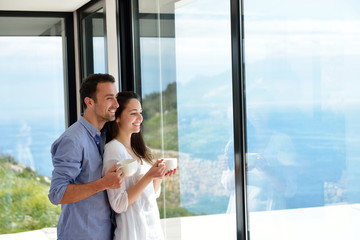 Wall Mural - relaxed young couple at home