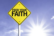 Feed your Faith road sign with sun background
