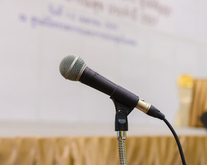 Close up of microphone in conference hall