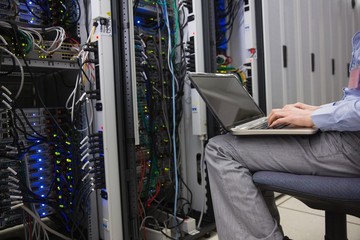 Poster - Technician sitting on swivel chair