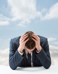 Poster - Composite image of businessman with head in hands