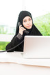 © siraphol - Arab business woman working