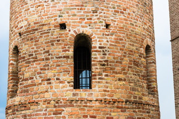 Wall Mural - Romanesque cylindrical bell tower of countryside church