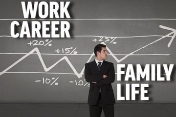 Poster - Composite image of businessman standing and looking