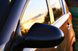 car sunset reflection