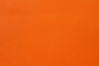 Closeup of seamless orange leather texture