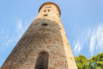 Wall Mural - Romanesque cylindrical bell tower of countryside church