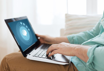 Poster - close up of man working with laptop at home