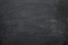 Close Up Of A Black Dirty Chalkboard