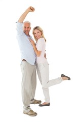 Poster - Smiling couple cheering at the camera