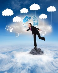 Aufkleber - Composite image of businesswoman stepping and balancing