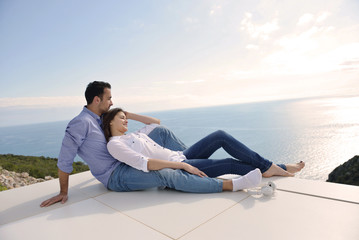 Wall Mural - relaxed young couple at home