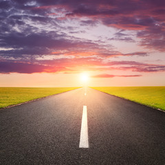 Canvas Print - Driving on an empty road at sunsrise