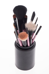 Wall Mural - Close-up set of  professional  pink make-up brushes  different s