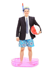 Poster - Businessman with snorkel standing in a small pool