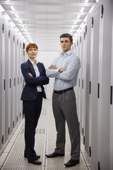 Wall Mural - Team of computer technicians smiling at camera