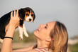 © godfer - woman with pet beagle dog