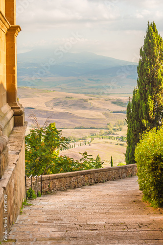 Naklejka na szybę Sunny streets of Italian city Pienza in Tuscany