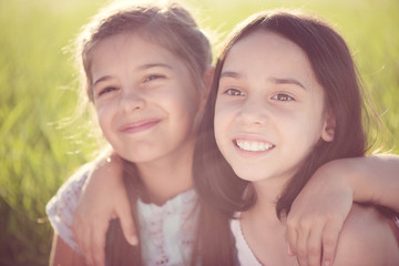 Wall Mural - Portrait of two hispanic teen girls