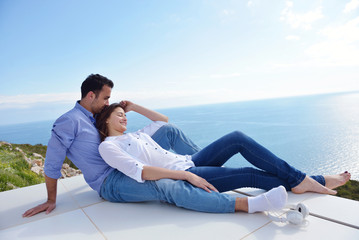 Wall Mural - relaxed young couple at home