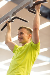 Sticker - smiling man exercising in gym