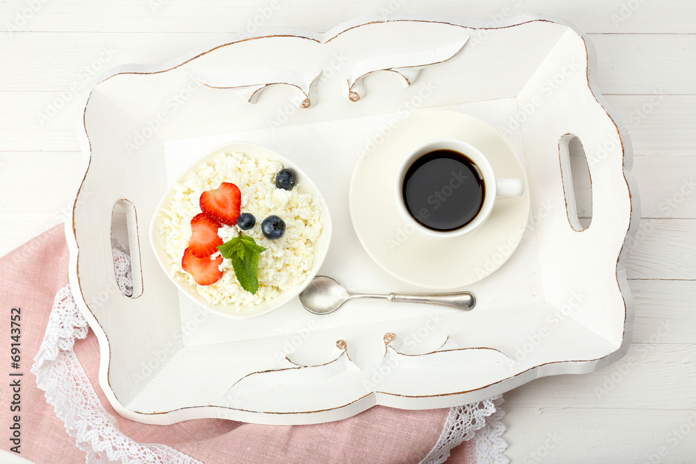 Delicious breakfast with coffee and cottage cheese