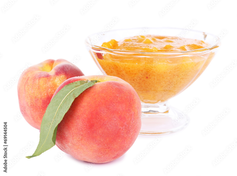 tasty peach jam with fresh peaches, isolated on white