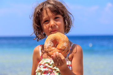 Girl eating donut