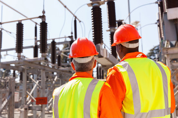 back view of two electrical engineers