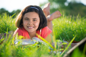 Wall Mural - Happy child studying on nature