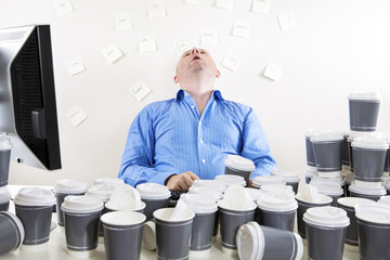 Wall Mural - Overworked and exhausted office worker