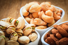 Varieties Of Nuts: Cashew, Pistachio, Almond.