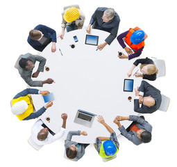 Wall Mural - Group of Business People in a Meeting