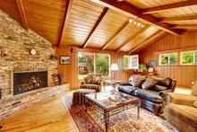 Luxury Log Cabin House Interior. Living Room With Fireplace And