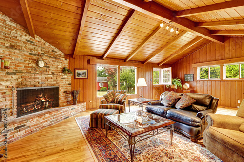 Luxury Log Cabin House Interior Living Room With Fireplace