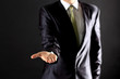 © yurolaitsalbert - Businessman performing a hand gesture.