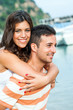 © karelnoppe - Girl piggybacking on boyfriend.