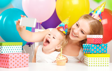 Wall Mural - selfie. birthday child with balloons, cake, gifts